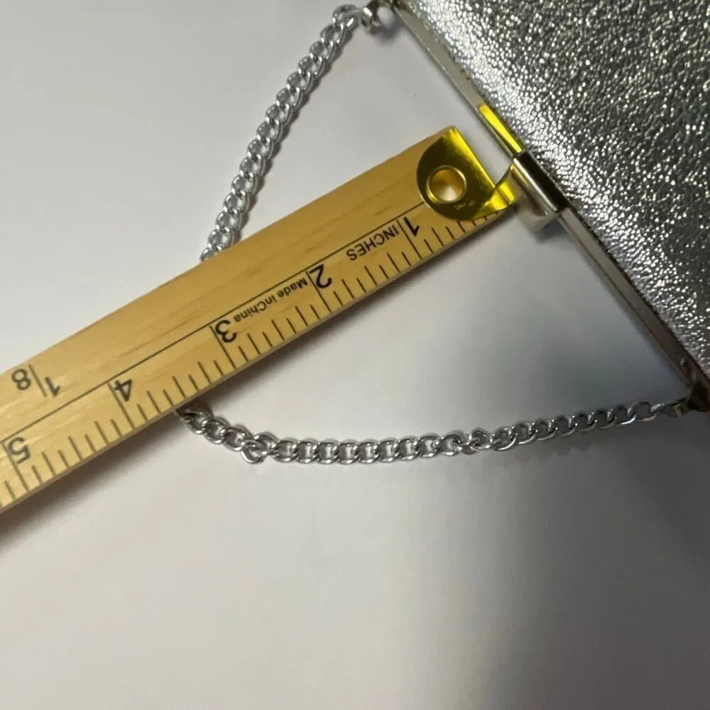 Vintage silver clutch with chain handle. Silver metallic